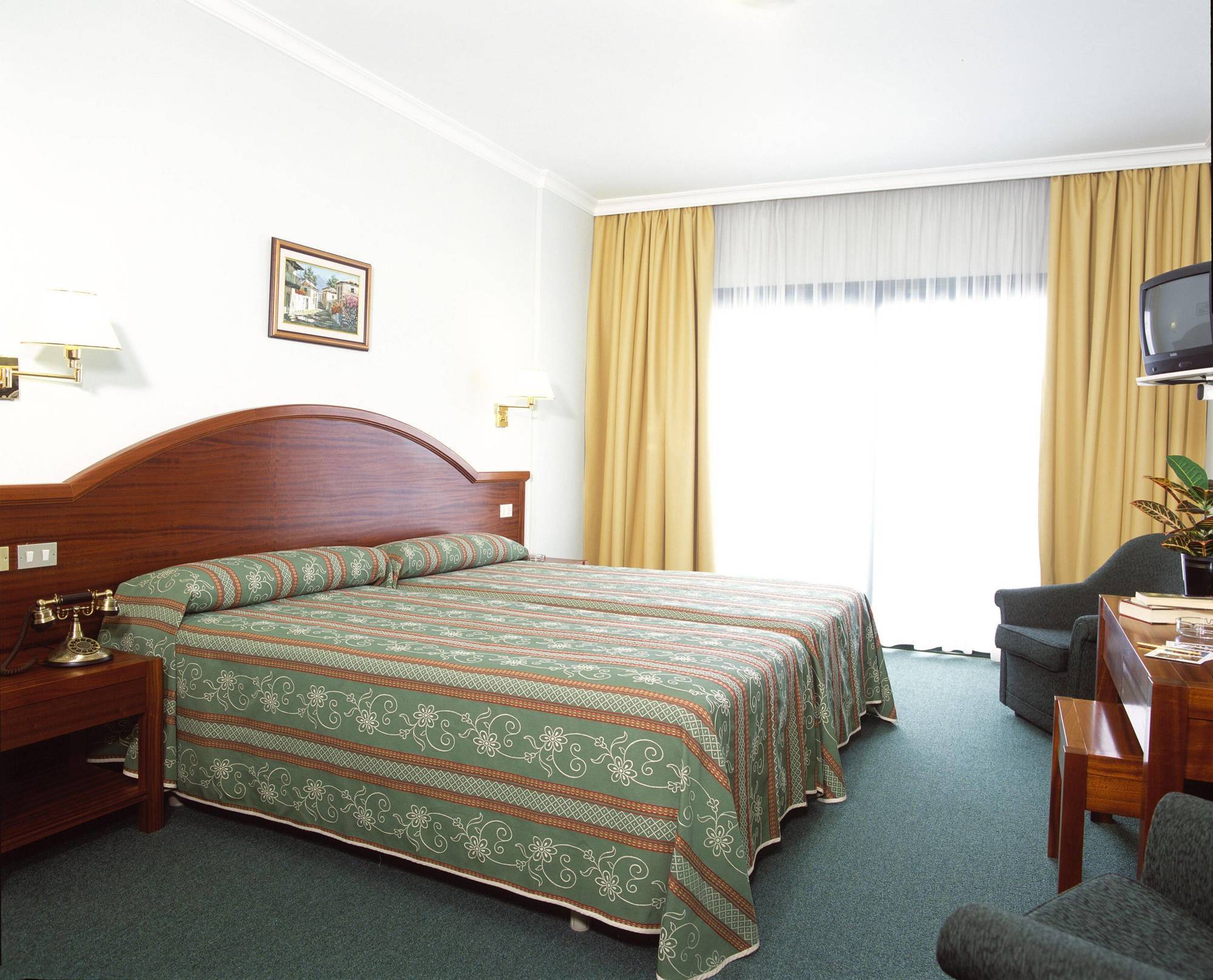 Hotel Don Manolito Пуерто-де-ла-Крус Номер фото